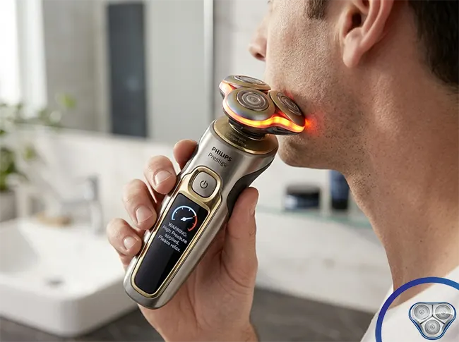 Philips Norelco i9000 Prestige Ultra rotary electric shaver review 2026 showing redesigned smaller rounded heads Active Pressure Guidance LED ring